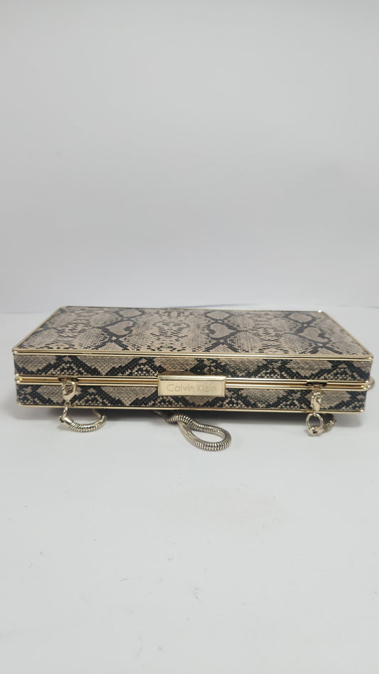 Calvin Klein Clutch Print Serpiente con Cadena Dorada