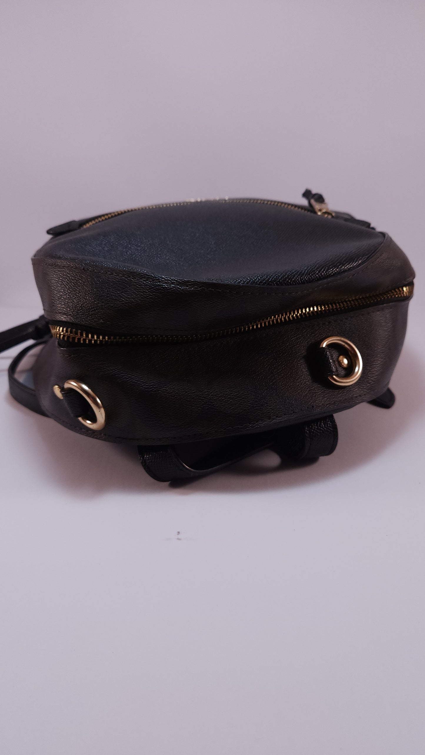Mochila Coach Negra con Detalles en Café y Canvas
