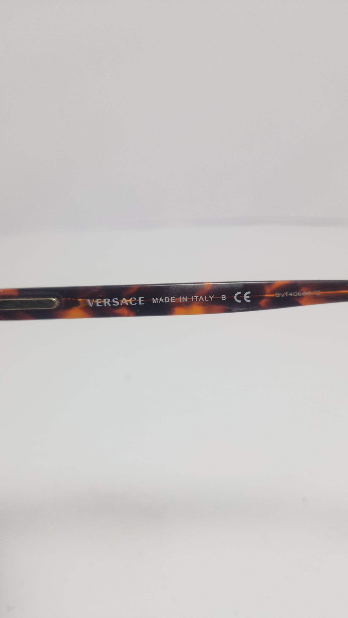 Versace Tortoise con Lentes Azul Espejo y Detalles Dorados