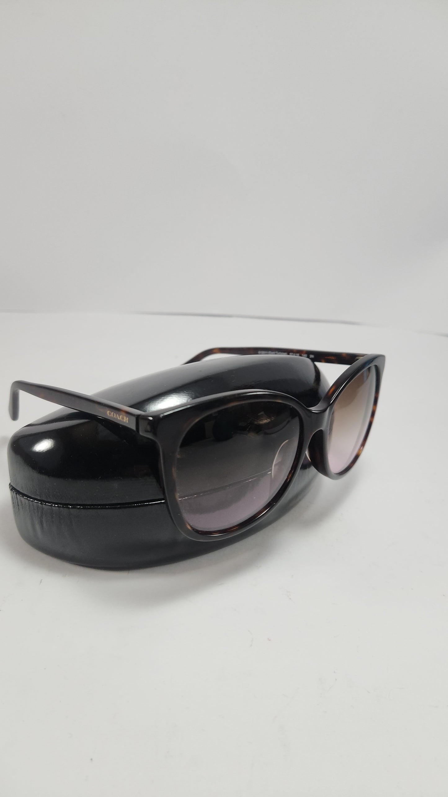 Lentes Coach Cafe