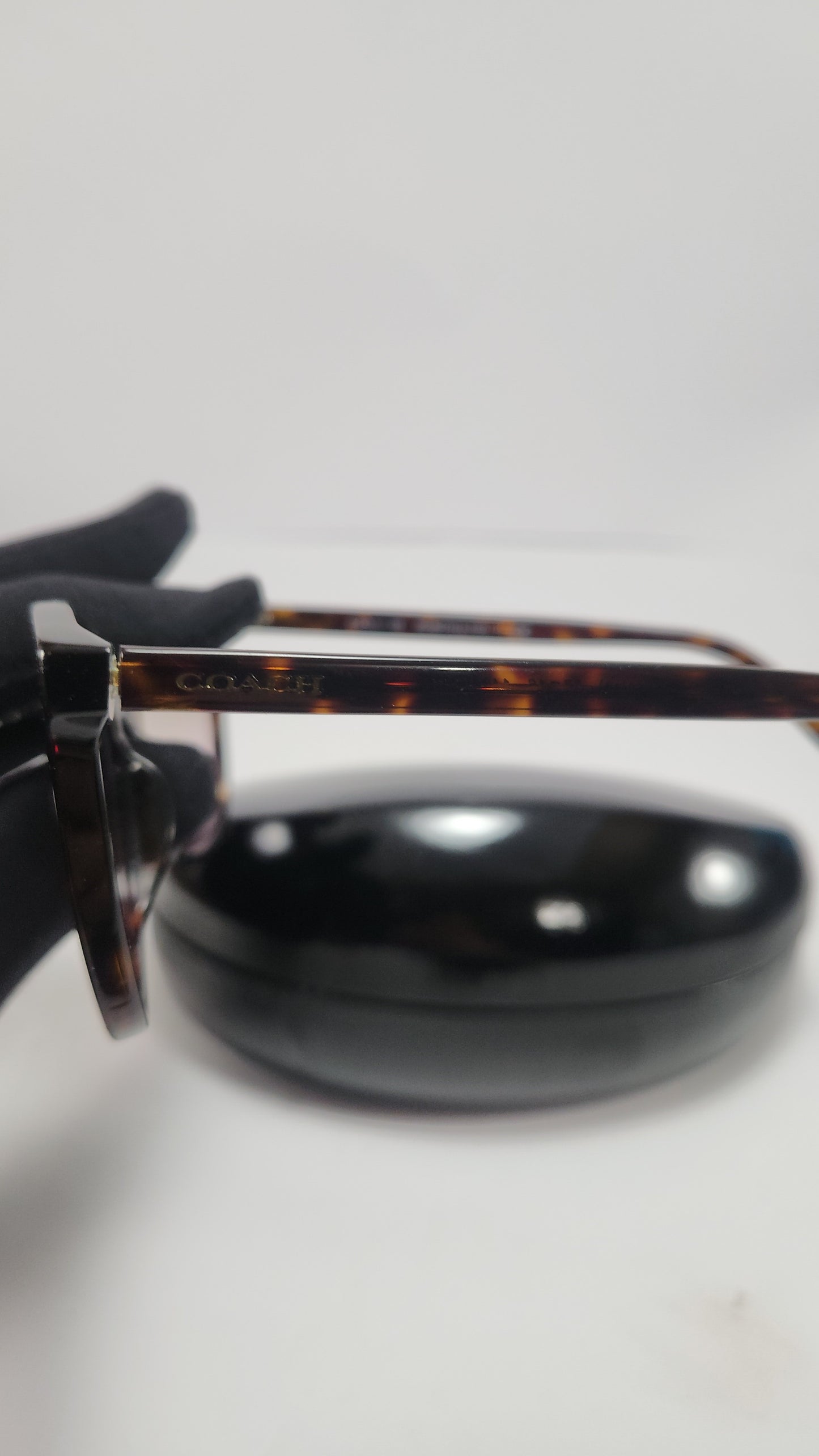 Lentes Coach Cafe